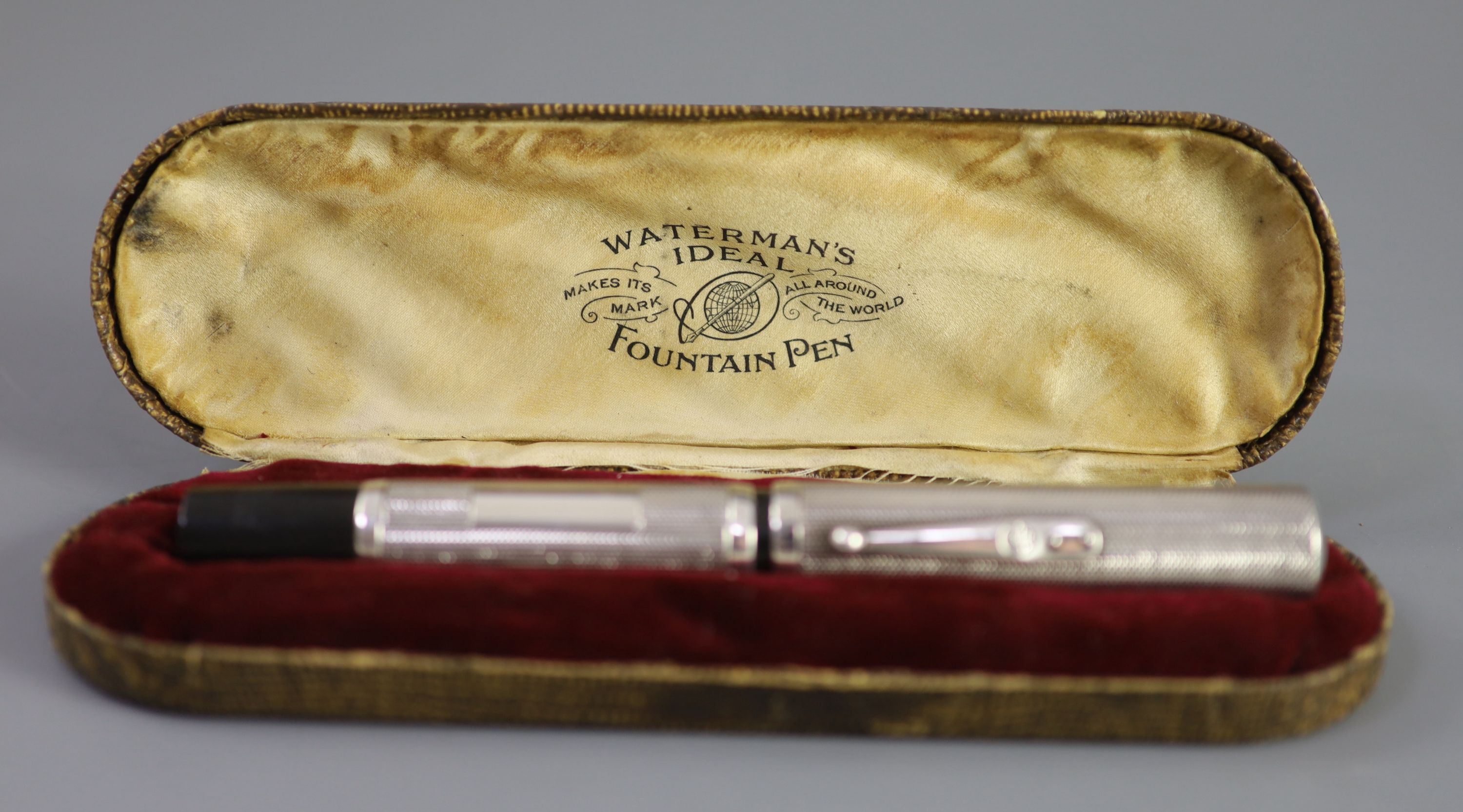 A rare giant Waterman's 58 Ideal silver overlaid fountain pen, 15.2 cm, Waterman’s case